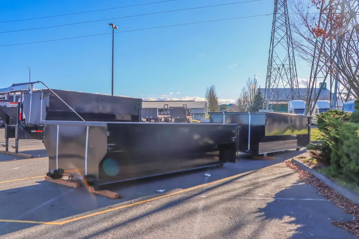 Roll-off dumpster ready for waste disposal at job site for Estate Cleanout Dumpster Rental in Fort Stewart